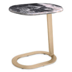 Eichholtz Side Table Oyo Prepare to be enchanted by the Oyo Side Table, a masterpiece of luxurious design and