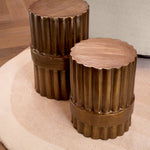 Eichholtz Side table Padua L luxury and artisan craftsmanship. The round shape top, adorned with an antique brass finish, captures