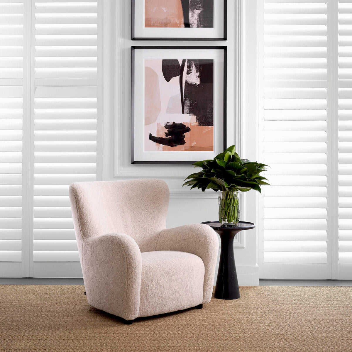 Eichholtz Side Table Pompano low riviera. It is crafted from solid Italian black marble in a seventies style shape. The