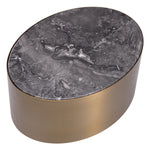 Eichholtz Side Table Porter oval Featuring an oval shape, this lovely end table pairs a brushed brass casing with a