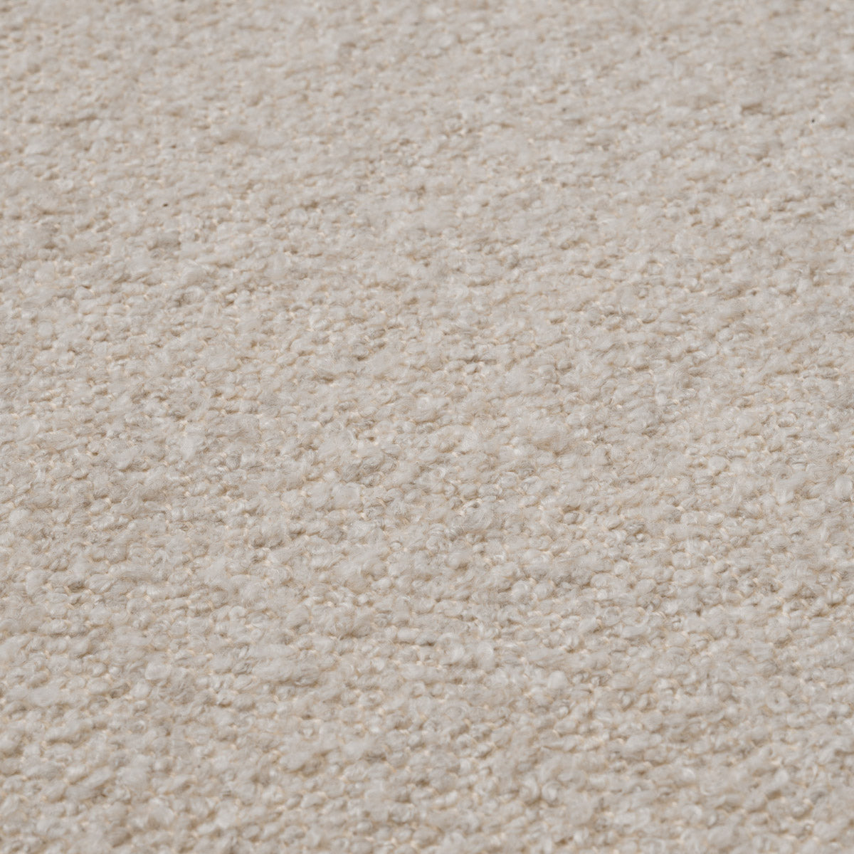 Eichholtz Sofa Brannan luxurious bouclé Chalk white fabric, this sofa exudes a sophisticated charm. The contrasting black base