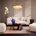 Eichholtz Sofa Corso S Upholstered in luxurious Lyssa off-white fabric and supported by sleek black feet, this compact piece