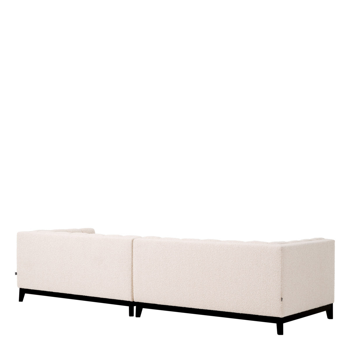 Eichholtz Sofa Ditmar L cream upholstery. Deep channel stitching gives this contemporary sofa a touch of nostalgia. Sofa Ditmar