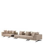 Eichholtz Sofa Endless possibilities. This ultra-stylish sofa has sturdy black feet and a warm avalon sand upholstery. Loose