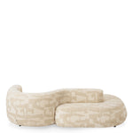 Eichholtz Sofa Julita Julita Sofa in Brooklyn sand. This exclusive piece from the iconic furniture brand features a