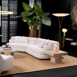 Eichholtz Sofa Malaga L has four scatter cushions and a unique form that makes it incredibly comfortable and easy