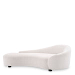 Eichholtz Sofa Rivolo The Rivolo lyssa off-white curved sofa with black feet is full of natural beauty. Organically