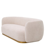Eichholtz Sofa Roxy back, around a circular seat. It will be a glamorous and comfortable addition to the
