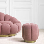 Eichholtz Stool Orchanic covered with soft-touch Bouclé rose and has a flower shape that is accentuated by deep