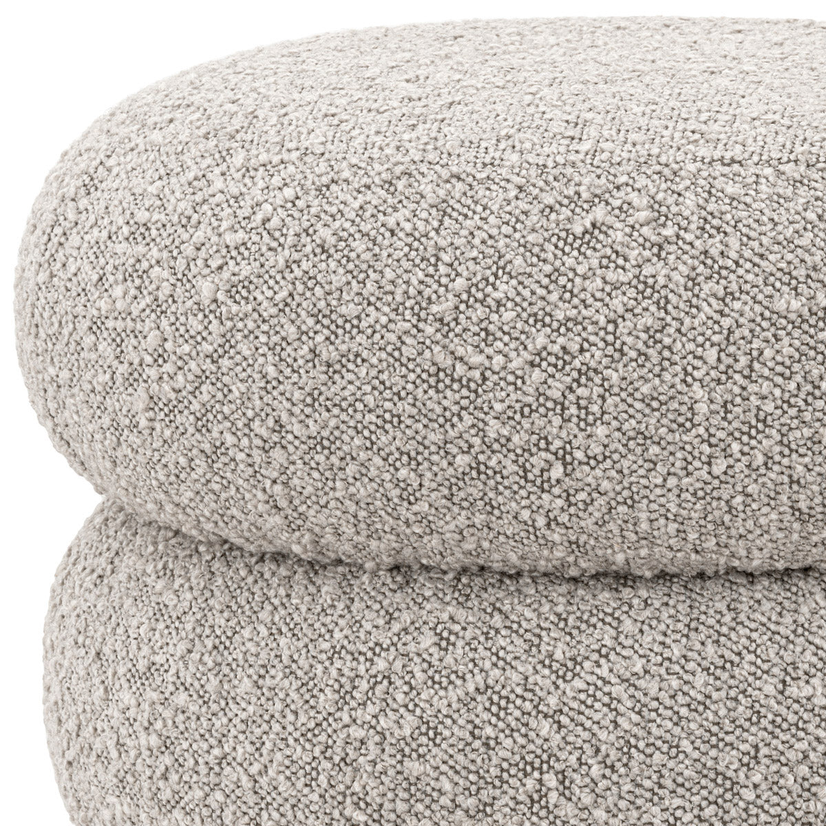 Eichholtz Stool Tulum by its unique marshmallow-like curves in bouclé grey upholstery. Black feet round out the captivating