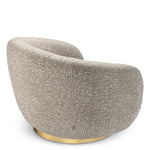 Eichholtz Swivel Chair Brice and a brushed brass swivel base. Eichholtz Atelier Our Eichholtz Atelier collection includes innovative mate...