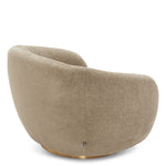 Eichholtz Swivel Chair Brice and a luxe brushed brass base. Complete your interior with the matching Brice Sofa. Eichholtz