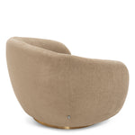 Eichholtz Swivel Chair Brice and a brushed brass swivel base. Combine it with Sofa Brice for a complete look.