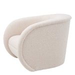 Eichholtz Swivel Chair Cristo flows a sheltering arc from arm to back, around a circular seat. It will be