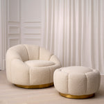 Eichholtz Swivel Chair Inger your home. Looking like an open flower, this delightful bouclé cream accent chair will be