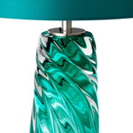 Eichholtz Table Lamp Barron a lively effect. Its elegant shape and fascinating texture are amplified by a restrained turquoise