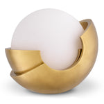 Eichholtz Table Lamp Cabo diffuser shade. The globe-shaped shade is partly covered by a vintage brass eyelid designed to