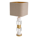 Eichholtz Table Lamp Cullingham brass finish. Mixing neutral tones and textures, this striking table lamp will sit well in