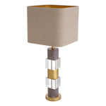 Eichholtz Table Lamp Cullingham brass finish. Mixing neutral tones and textures, this striking table lamp will sit well in