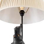 Eichholtz Table lamp Horus to as "Nectanebo-the-Falcon." This regal lamp, which boasts a copper-bronze finish and a beige pleated