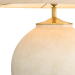 Eichholtz Table Lamp Moon Jar a sand- and brushed-brass finish and a handmade linen-mix shade from the Netherlands. This sophisticated