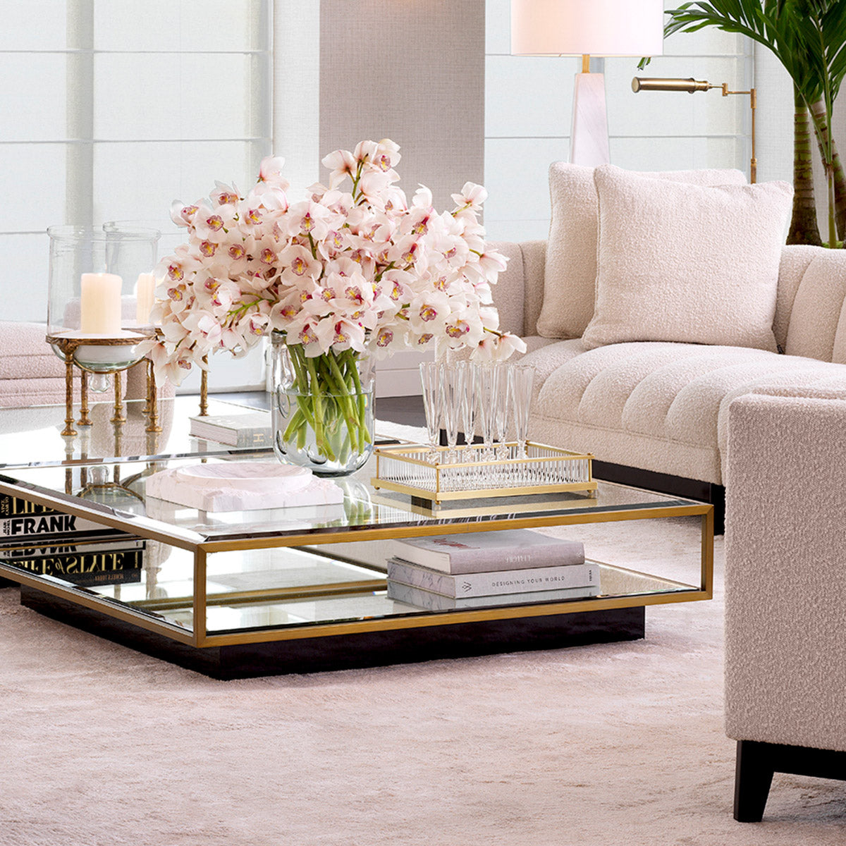 Eichholtz Tray Cora rectangular mirror glass bottom and clear glas rods has an antique brass finish. Ideal as a