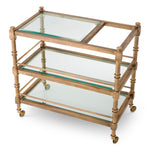 Eichholtz Trolley Alexia store glassware, spirits and accessories. Sleek side bars hold all items in place. The top