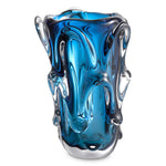 Eichholtz Vase Aila L Handblown from blue glass and embellished with arc-shaped decorations, Vase Aila is a perfect fit