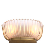Eichholtz Wall Lamp Artos With a bowl-shaped shade of thick frosted glass and a vintage brass fixture, it will