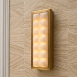 Eichholtz Wall Lamp Cabildo lustrous antique brass frame, delicately housing radiant alabaster panels. Discover the transformative glow o...