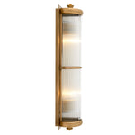 Eichholtz Wall Lamp Glorious XL Lamp. This alluring Art Deco inspired luminaire features a matte brass finish and clear glass