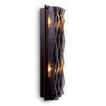 Eichholtz Wall Lamp Nuvola L Thick plates of smoked glass create a striking relief pattern with geometric lines, giving the