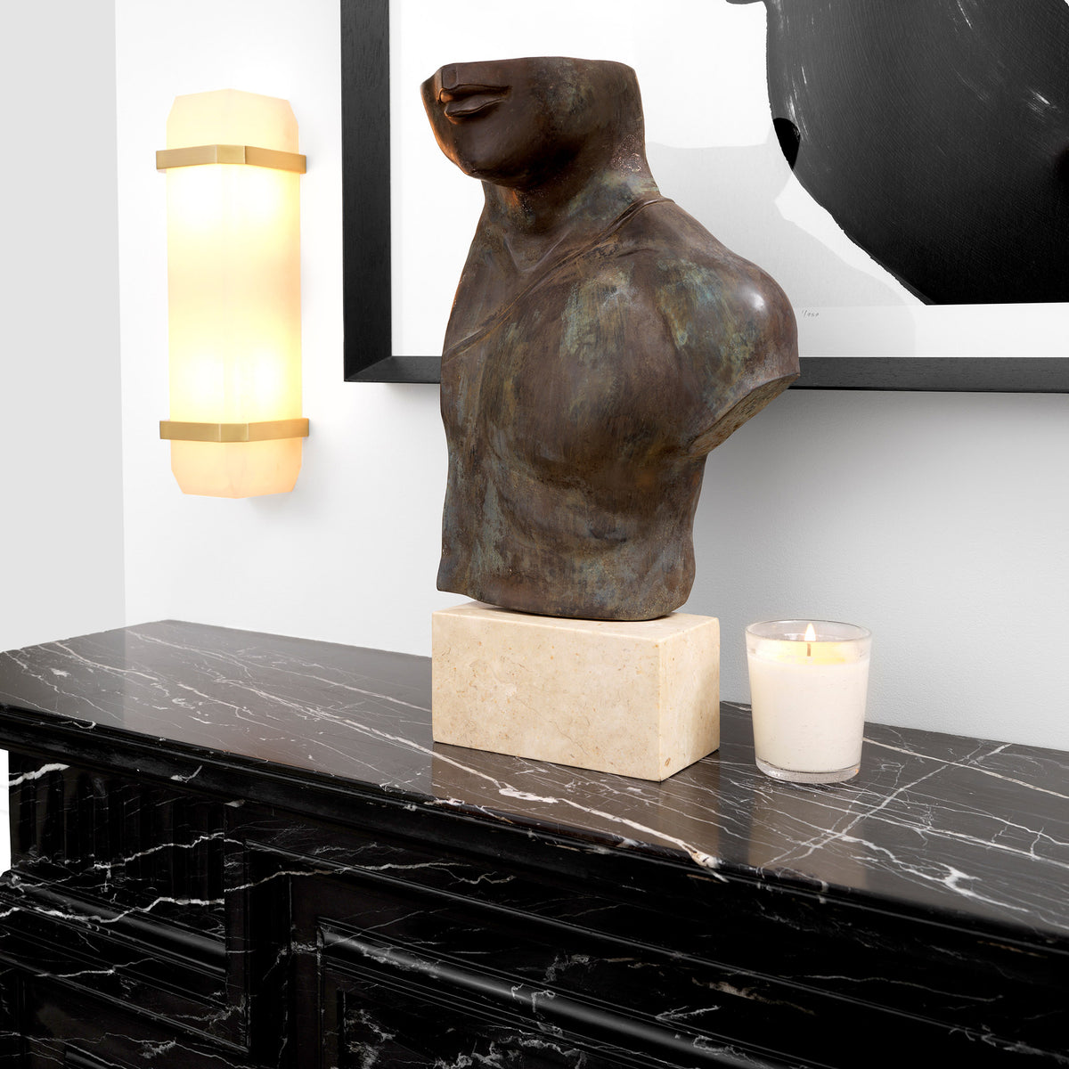 Eichholtz Wall Lamp Pandora a block of ice. Made of translucent alabaster and fitted with chamfered corners, it allows