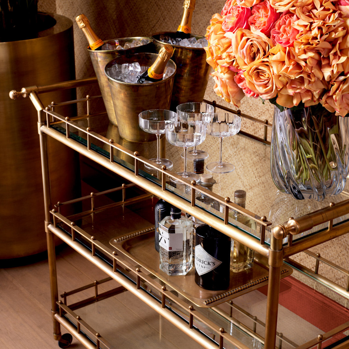 Eichholtz Wine Cooler Christian design, featuring three interconnected bucket forms, offers both elegance and practicality. This luxuriou...