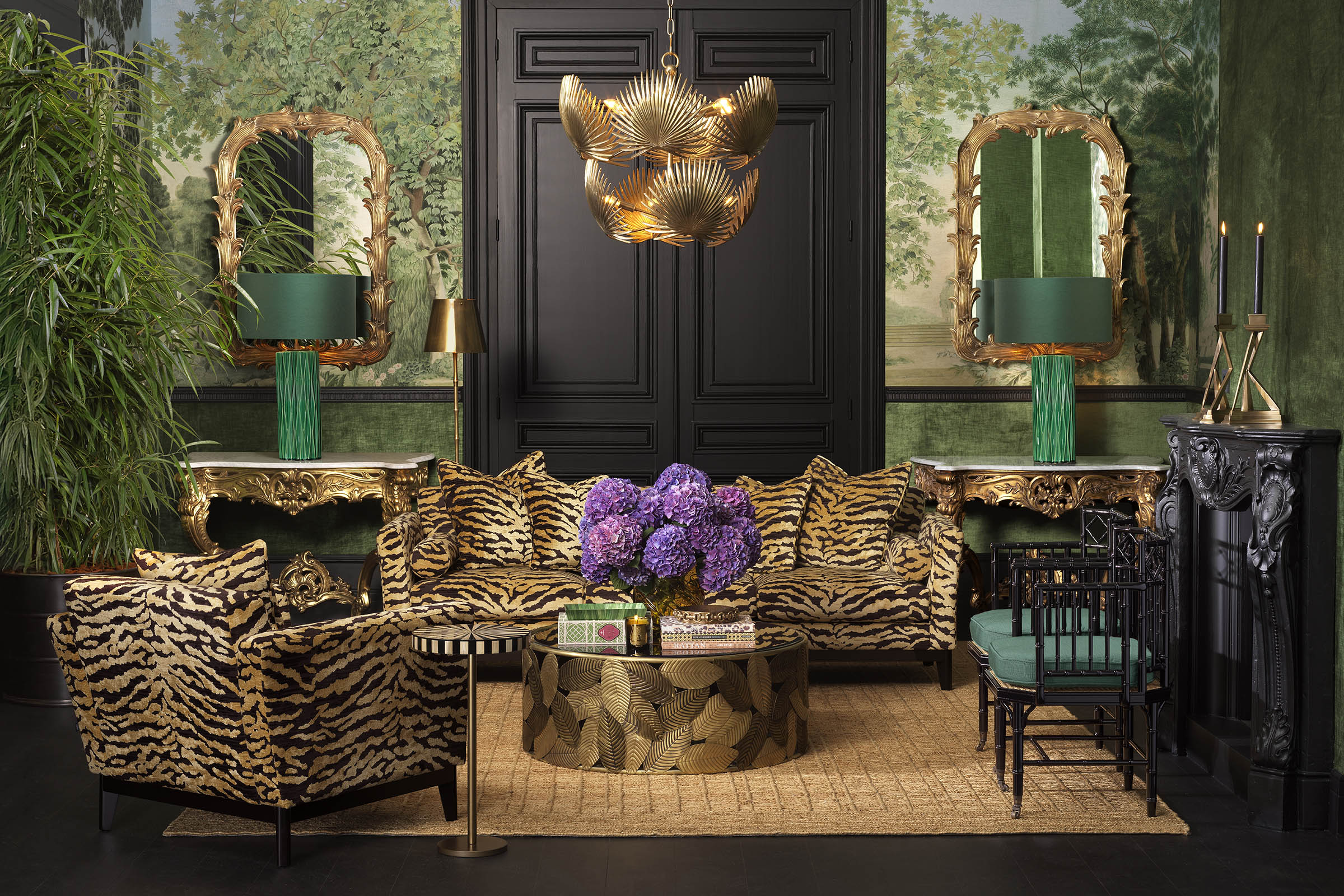 Two Eichholtz console tables with ornate gold mirrors and emerald table lamps — a console-mirror-lamp vignette composition
