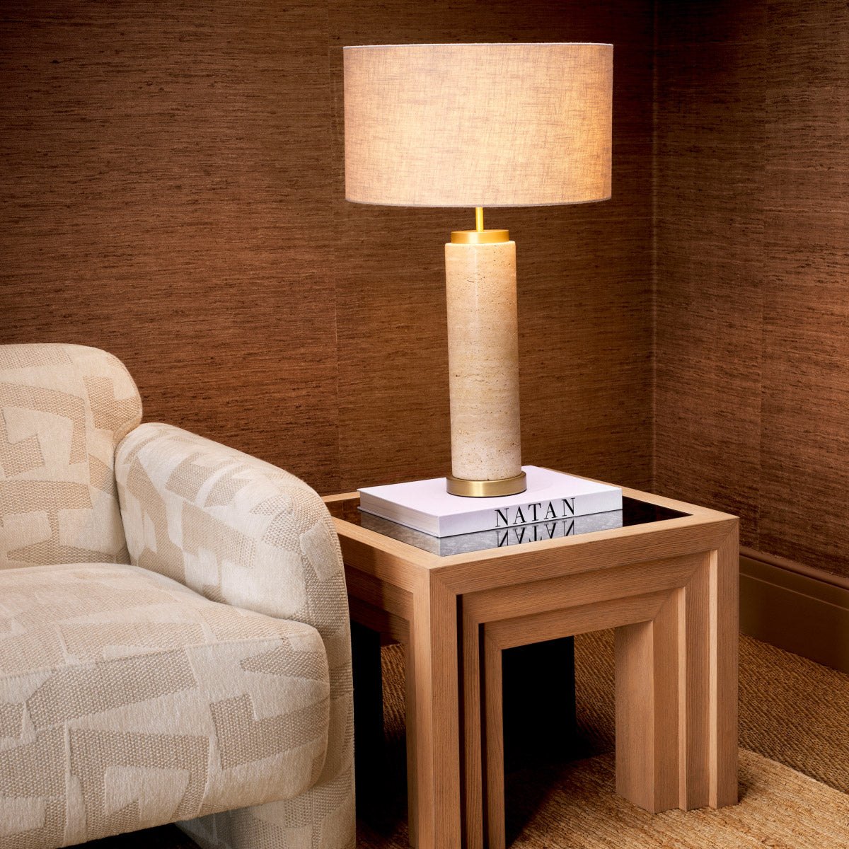 A luxury living room vignette featuring the Eichholtz Side Table Metropolitan — open-grain oak veneer base with antiqued mirror glass top, from The Met × Eichholtz collection