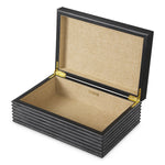 Eichholtz Box Elvane black leather luxury to an essential homeware accessory. The concentric ridge detailing adds texture and depth, creating
