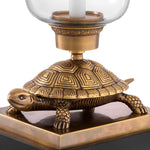 Eichholtz Hurricane Tortoise vintage brass finish Classic with a twist, the Tortoise Hurricane Candle Holder brings inspired style to your living spac
