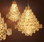 Eichholtz Chandelier Hermitage L nickel finish Channel glamorous designer style into your interior setting with the Hermitage L Chandelier. Instead