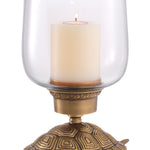Eichholtz Hurricane Tortoise vintage brass finish Classic with a twist, the Tortoise Hurricane Candle Holder brings inspired style to your living spac
