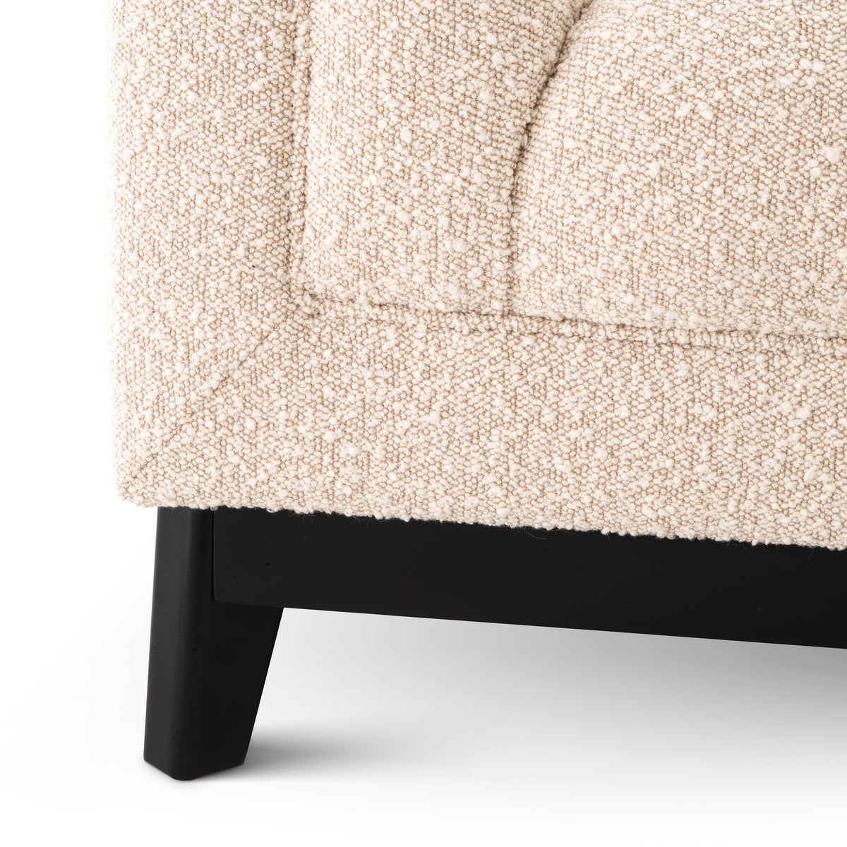 Eichholtz Chair Ditmar bouclé cream Resting upon a black finish base and upholstered in cream-coloured bouclé, Chair Ditmar will bring l