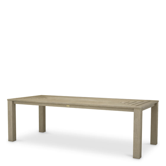 Eichholtz Outdoor Dining Table Vistamar aged teak Elevate outdoor dining with the Outdoor Dining Table Vistamar in aged teak. Featuring a modern desig