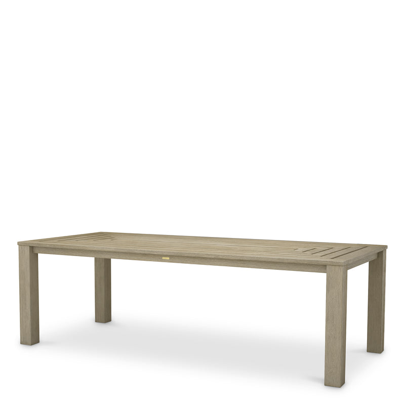 Eichholtz Outdoor Dining Table Vistamar aged teak Elevate outdoor dining with the Outdoor Dining Table Vistamar in aged teak. Featuring a modern desig