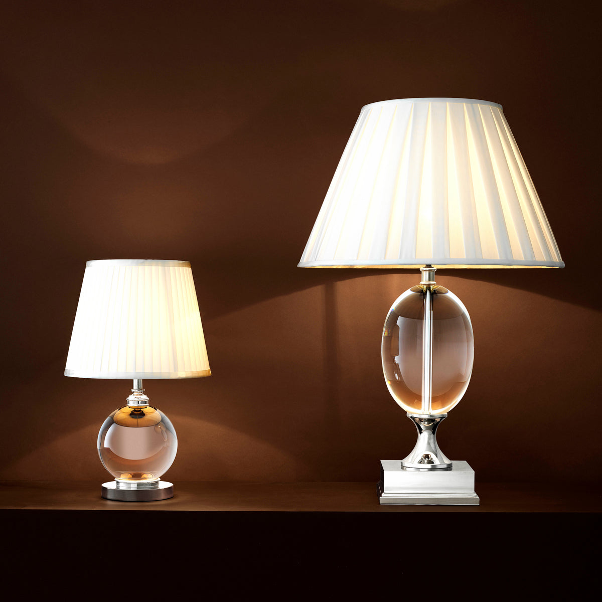 Eichholtz Table Lamp Octavia Crystal Bring simple elegance into your home with the understated Octavia Table Lamp. The crystal glass ball