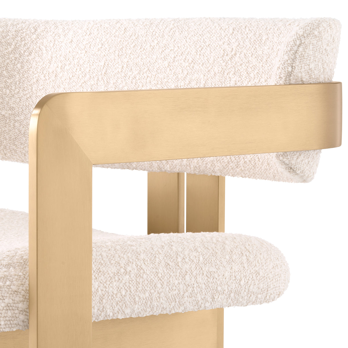 Eichholtz Chair Donato brushed brass finish bouclé cream Architectural design meets luxe materials in the statement Donato Chair. Cream bouclé wraps around