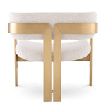 Eichholtz Chair Donato brushed brass finish bouclé cream Architectural design meets luxe materials in the statement Donato Chair. Cream bouclé wraps around