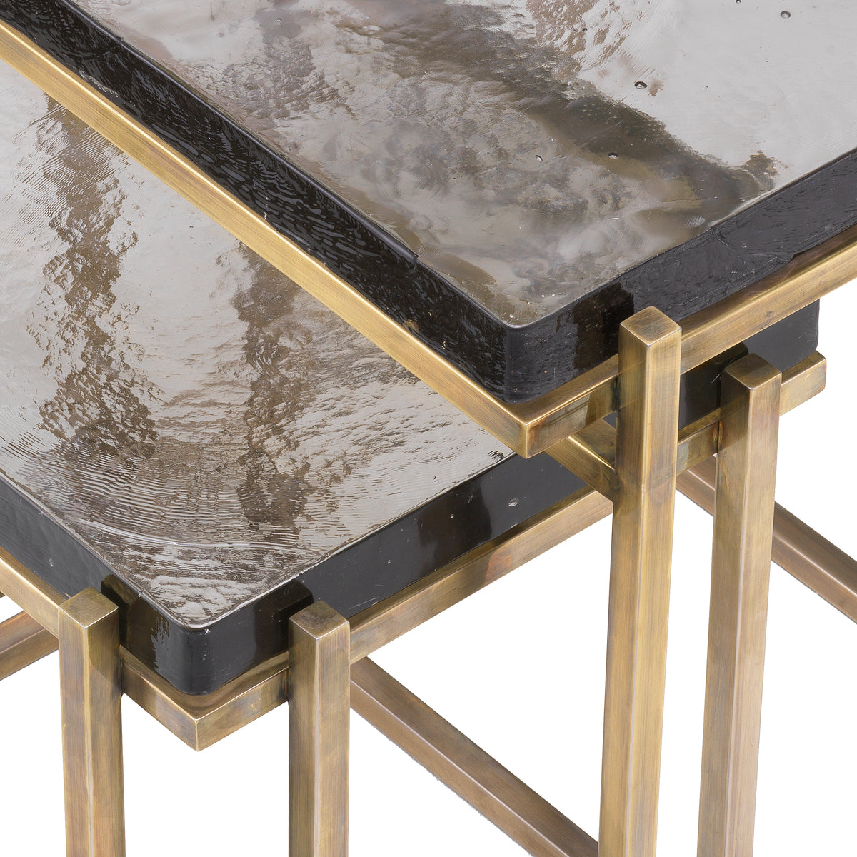 Eichholtz Side Table Niemeyer vintage brass finish set of 2 The Niemeyer Side Table set is a beautiful pair of two tables featuring a vintage brass finish 