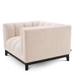 Eichholtz Chair Ditmar bouclé cream Resting upon a black finish base and upholstered in cream-coloured bouclé, Chair Ditmar will bring l