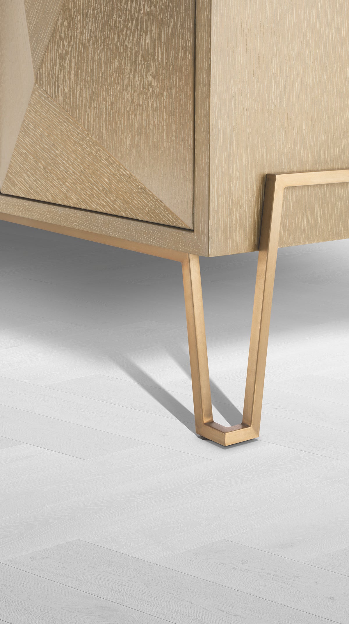 Eichholtz Dresser Highland washed oak veneer The washed oak veneer Highland Cabinet combines a brushed brass finished frame with washed oak venee