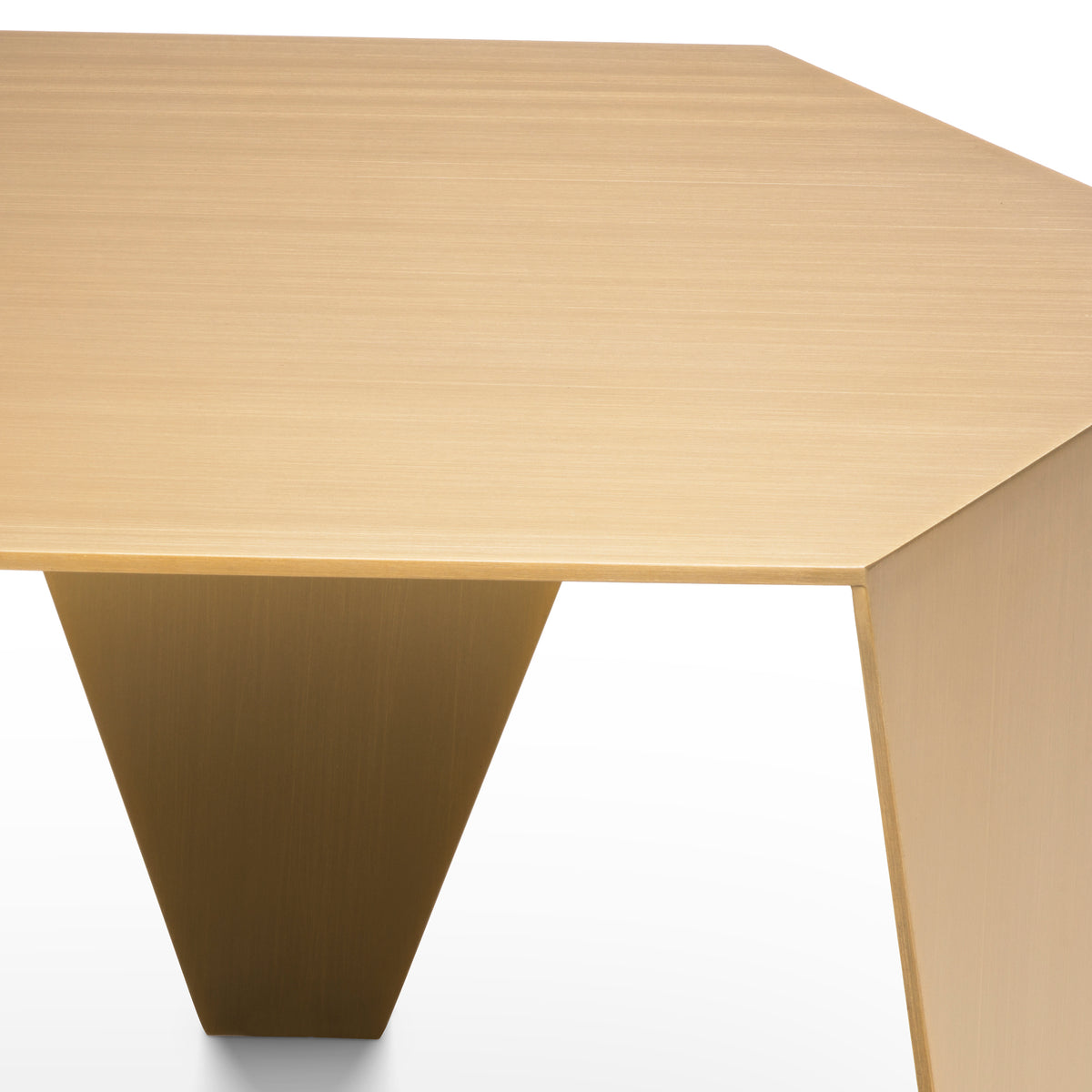 Eichholtz Side Table Metro Chic brushed brass finish With a hexagonal table top and three tapered legs in a brushed brass finish, the Metro Chic Side Tab